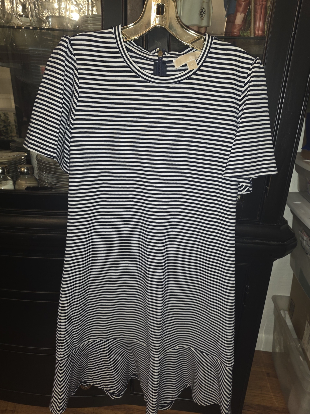 Label shows brand and striped knit